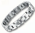 A stainless steel bracelet with rectangular links and a secure link closure.
